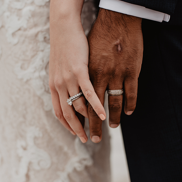 couple wearing eternity rings